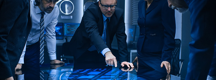 CISO pointing out information security concerns on a digital board