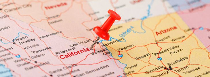 U.S. map with red push pin in California
