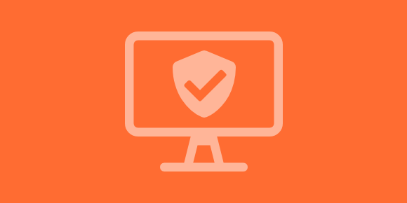 outline of a computer monitor with security shield on orange background