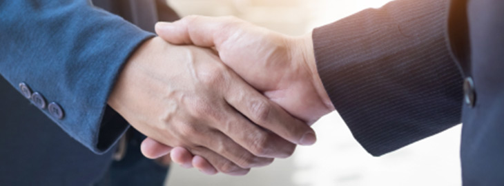 closeup of two businessmen shaking hands