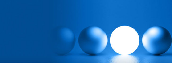 glowing sphere between other blue spheres on a blue background