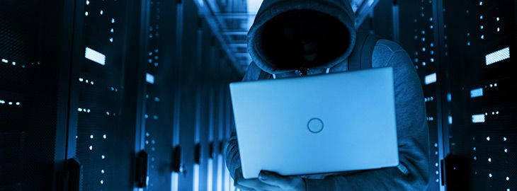 hooded hacker spoofing DNS