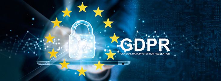 businessman holding tablet with GDPR logo overlay